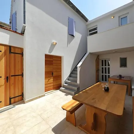 Stone House In The Center Of Town